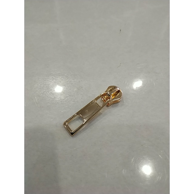 Бігунок сумковий без фіксатора на металеву блискавку No5 золото Бігунок сумковий без фіксатора на металеву блискавку No5 золото